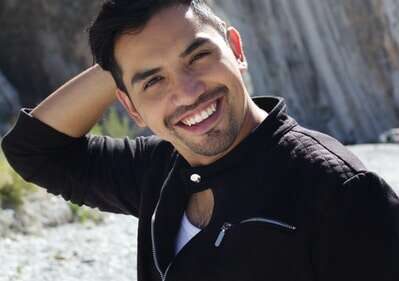 young man with a perfectly white smile